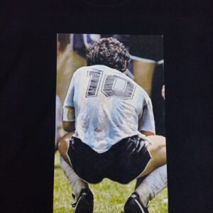Diego Maradona cuclillas